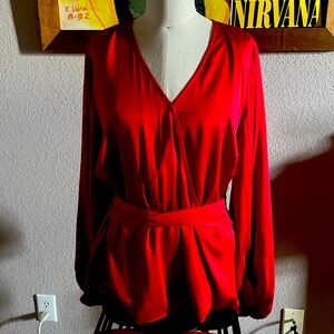 Pretty red blouse. Perfect for Christmas.